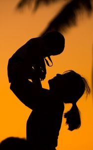 Preview wallpaper silhouettes, mother, child, sunset