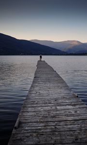 Preview wallpaper silhouettes, pier, lake, water, mountains, nature