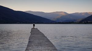 Preview wallpaper silhouettes, pier, lake, water, mountains, nature
