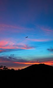 Preview wallpaper silhouettes, plane, horizon, mountain, sunset, landscape