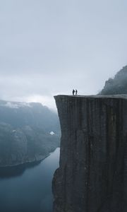 Preview wallpaper silhouettes, rock, cliff, lake, mist