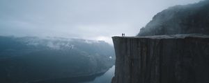 Preview wallpaper silhouettes, rock, cliff, lake, mist