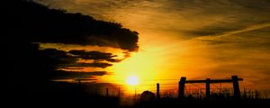 Preview wallpaper silhouettes, sun, clouds, sky, sunset, dark, landscape
