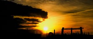 Preview wallpaper silhouettes, sun, clouds, sky, sunset, dark, landscape