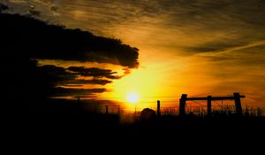 Preview wallpaper silhouettes, sun, clouds, sky, sunset, dark, landscape