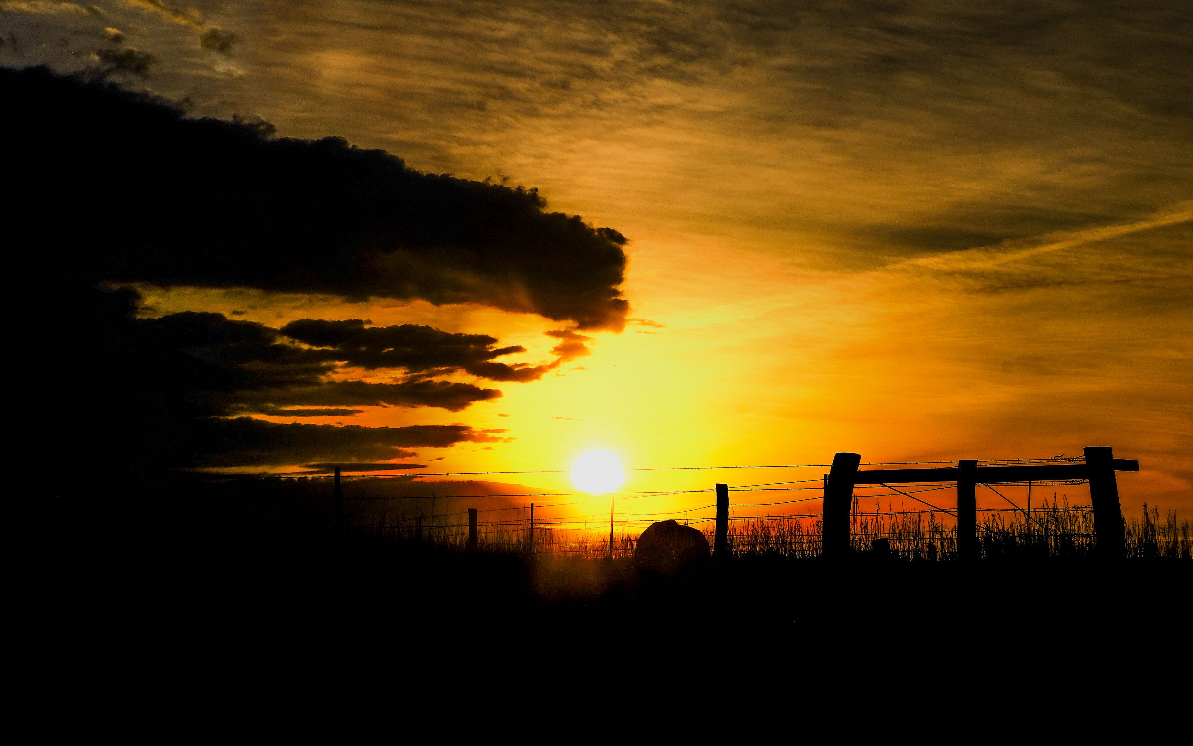 3840x2400 Wallpaper silhouettes, sun, clouds, sky, sunset, dark, landscape