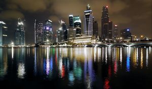Preview wallpaper singapore, night, building, reflection, colorful