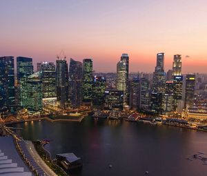 Preview wallpaper singapore, sunset, river, buildings, skyscrapers