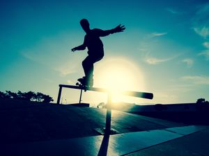Preview wallpaper skate, board, athlete, railings, motion, silhouette, ice rink