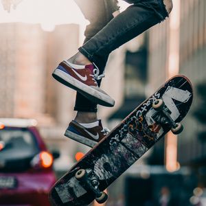 Preview wallpaper skateboard, legs, sneakers, street, rays