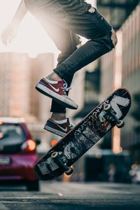 Preview wallpaper skateboard, legs, sneakers, jump, trick