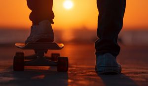 Preview wallpaper skateboard, legs, sunset, light