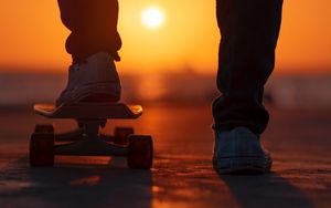 Preview wallpaper skateboard, legs, sunset, light