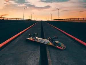 Preview wallpaper skateboard, road, marking, sky