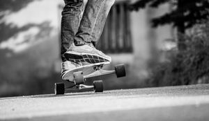 Preview wallpaper skateboard, skate, bw, legs, sneakers