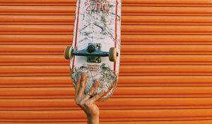 Preview wallpaper skateboard, skate, hand, wall