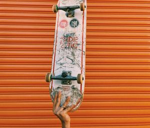 Preview wallpaper skateboard, skate, hand, wall