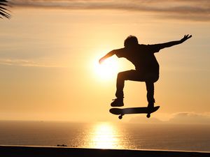 Preview wallpaper skateboard, skate, skater, trick, silhouette, sunset