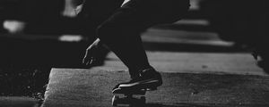 Preview wallpaper skateboard, skateboarder, bw, dark, asphalt
