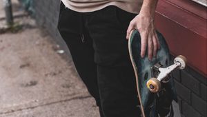 Preview wallpaper skateboard, sneakers, man, arm, legs