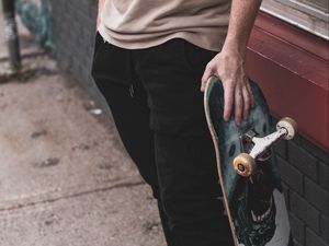 Preview wallpaper skateboard, sneakers, man, arm, legs