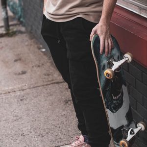 Preview wallpaper skateboard, sneakers, man, arm, legs