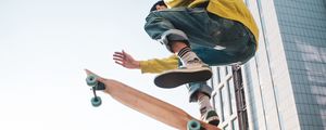 Preview wallpaper skateboarder, skate, jump, trick, city, extreme