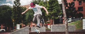 Preview wallpaper skateboarder, skateboard, trick, street