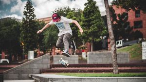 Preview wallpaper skateboarder, skateboard, trick, street