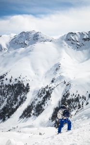 Preview wallpaper skier, mountains, snow, top, winter