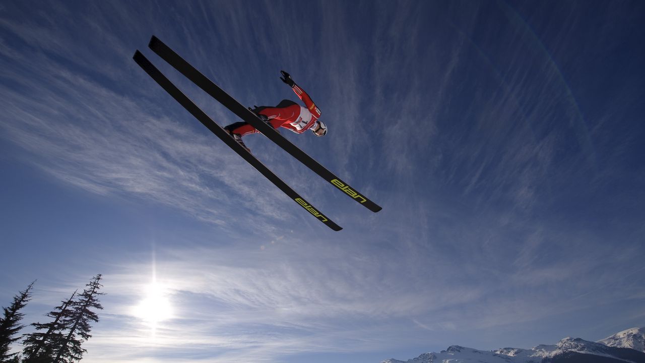 Wallpaper skier, ski, jump, fly, sky, sun, mountains