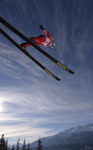 Preview wallpaper skier, ski, jump, fly, sky, sun, mountains