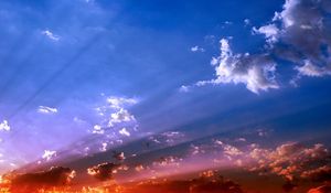 Preview wallpaper sky, beams, sun, light, orange, blue, brightly