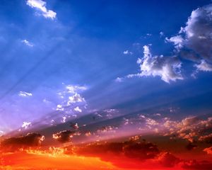 Preview wallpaper sky, beams, sun, light, orange, blue, brightly