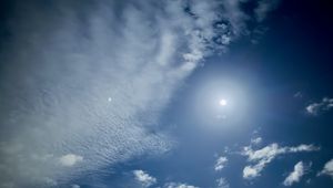 Preview wallpaper sky, clouds, blue, halo, sun