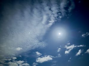 Preview wallpaper sky, clouds, blue, halo, sun