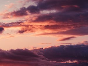 Preview wallpaper sky, clouds, pink, sunset