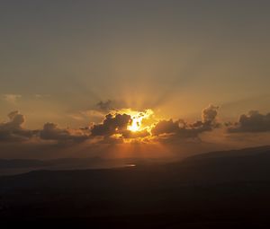 Preview wallpaper sky, clouds, rays, sunset, dark