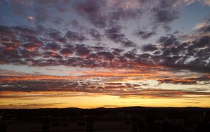 Preview wallpaper sky, clouds, sunset, building