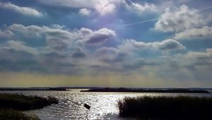 Preview wallpaper sky, clouds, water, thickets, canes, ripples