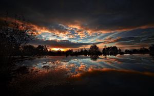 Preview wallpaper sky, evening, decline, darkness, reflection, lake, trees, outlines, surface