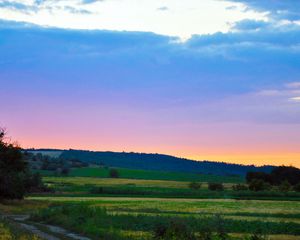 Preview wallpaper sky, evening, landscape, field, road, country, silence, serenity