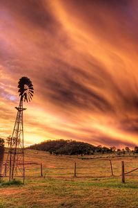 Preview wallpaper sky, evening, mill, transformer, current, field, clouds