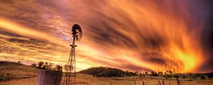 Preview wallpaper sky, evening, mill, transformer, current, field, clouds