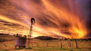 Preview wallpaper sky, evening, mill, transformer, current, field, clouds