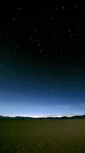 Preview wallpaper sky, field, mountains, starry sky, dark