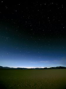 Preview wallpaper sky, field, mountains, starry sky, dark