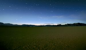 Preview wallpaper sky, field, mountains, starry sky, dark