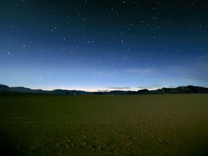 Preview wallpaper sky, field, mountains, starry sky, dark