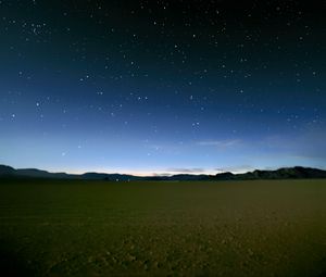 Preview wallpaper sky, field, mountains, starry sky, dark